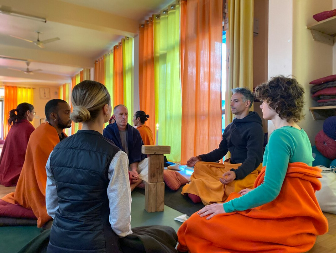 Group of employees in a relaxed wellbeing workshop